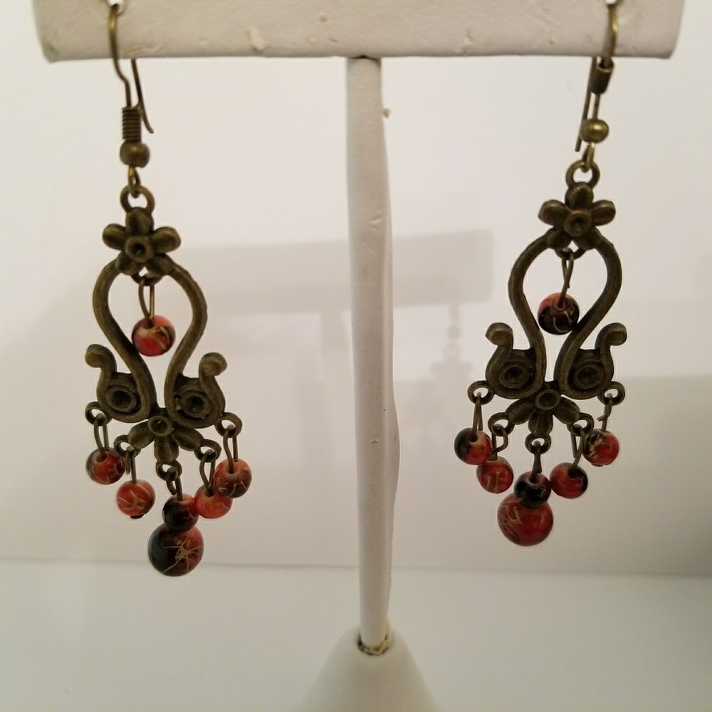 Brand new chandelier earrings, red stone